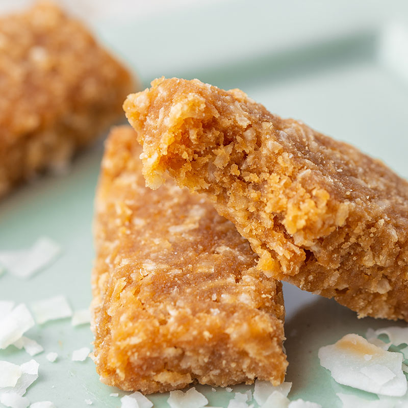Indulgent Vegan Coco D'lish bars with a sweet, tropical taste
